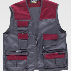 Gilet tipo safari,con cerniera. Multitasche. Scollatura a V.